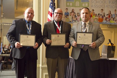 David Poore (center) of APW receives his CDF recertification